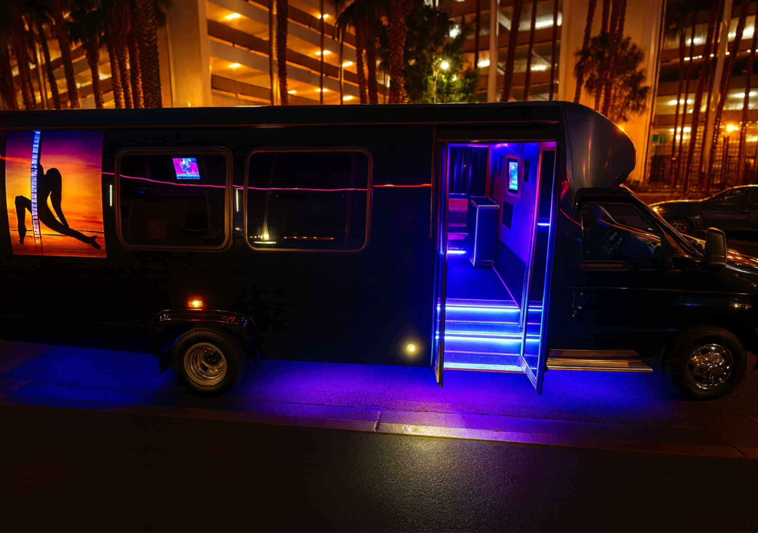Diabla 24-passenger Las Vegas karaoke party bus with open door, lit steps, and dancer silhouette—perfect for fun group nights.