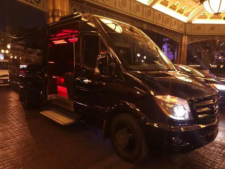 Luxury Sprinter van parked at the Bellagio on the Las Vegas Strip — ideal for VIP travel, weddings, corporate groups, and small-party transportation.